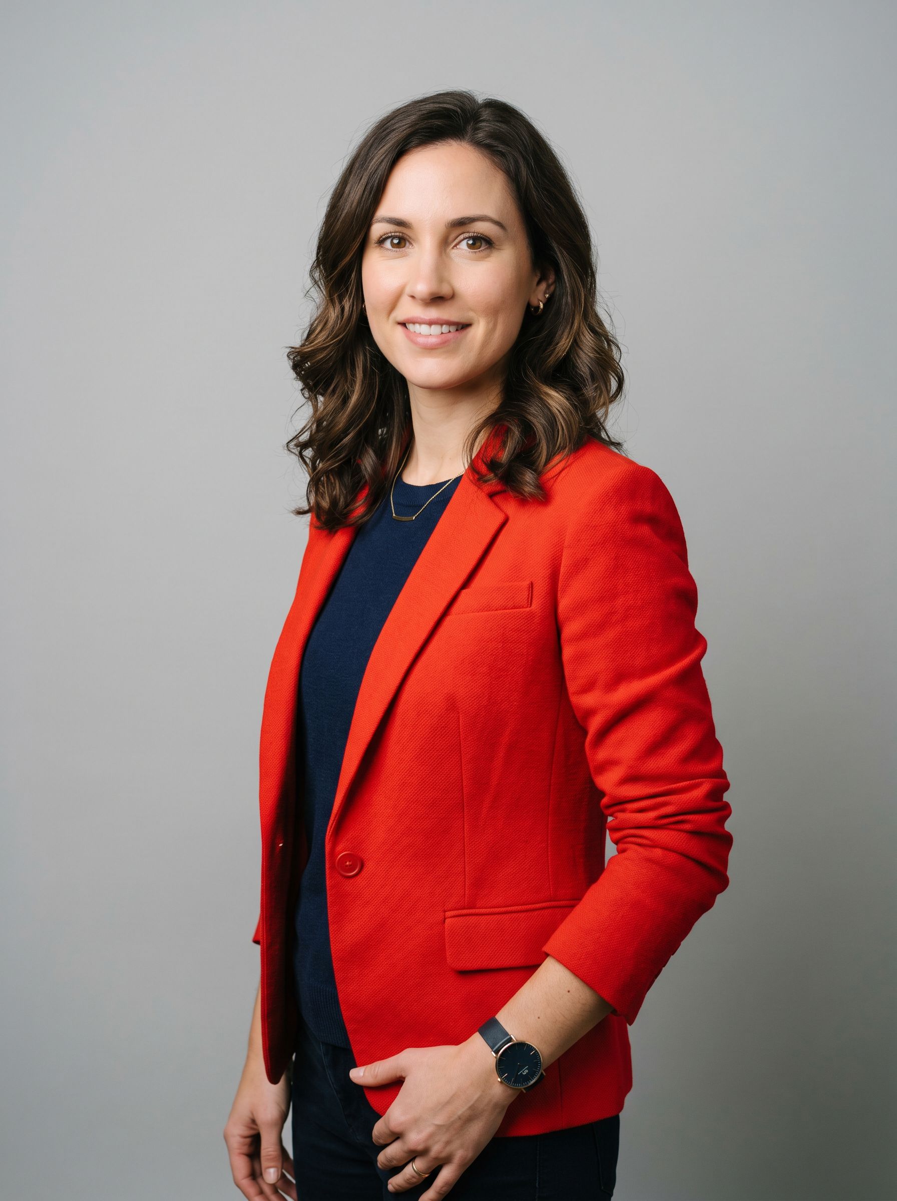 Character reference before NanoBanana 2 — single portrait of woman in red jacket, neutral studio backdrop