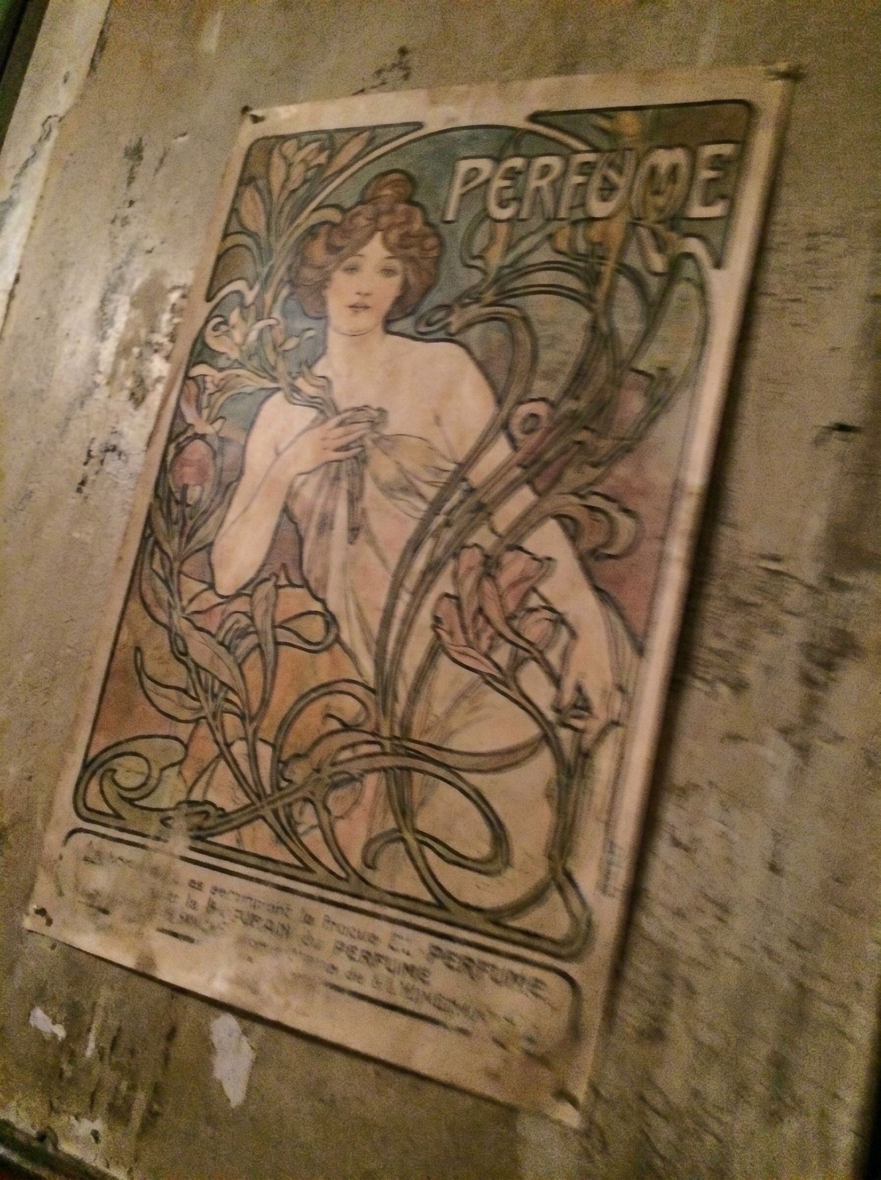 Blurry phone photo of a vintage poster before AI image upscaling