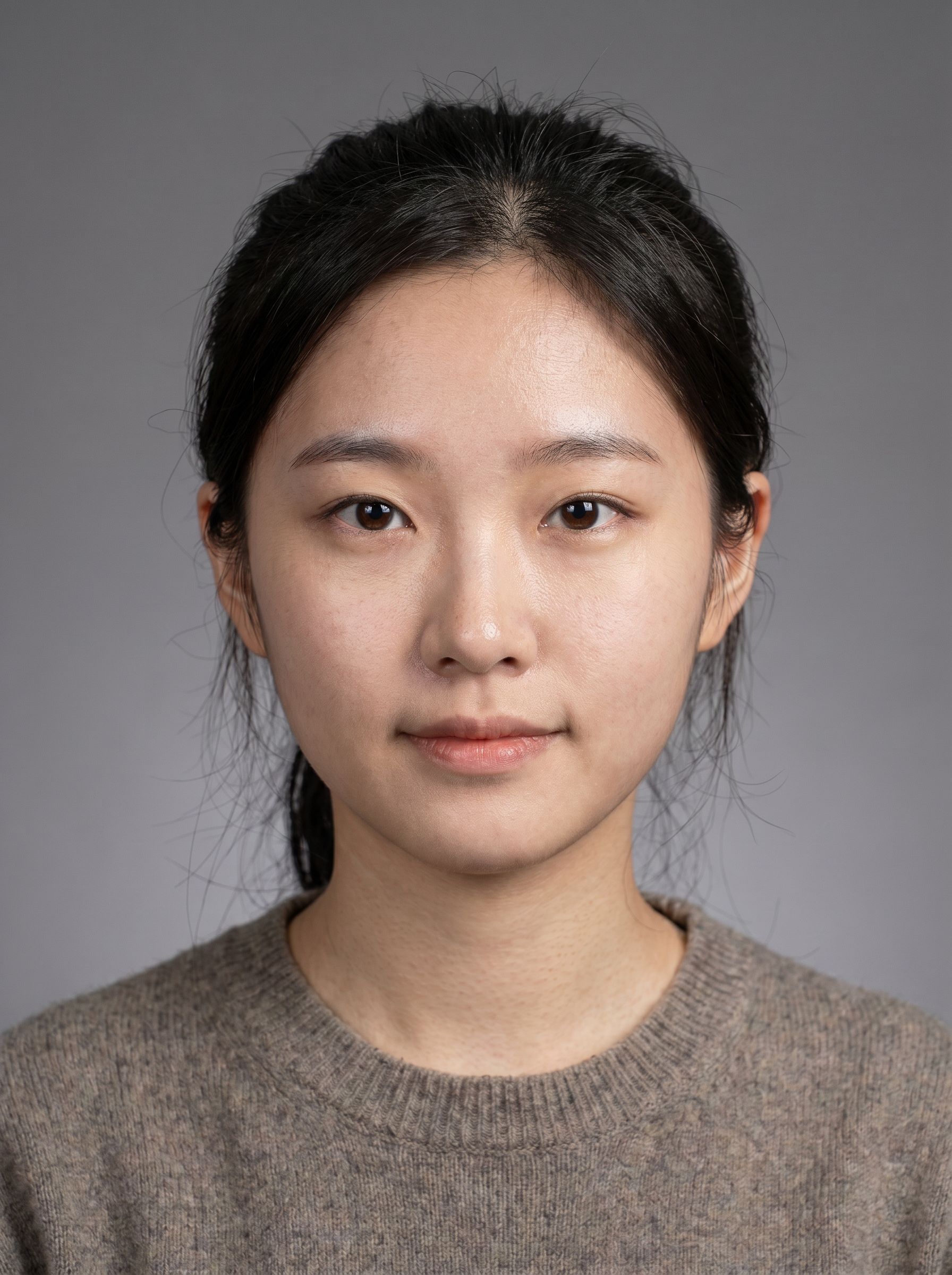 Gen NanoBanana AI upscaler result: sharper portrait with cleaner skin texture and hair detail after 2× enlargement